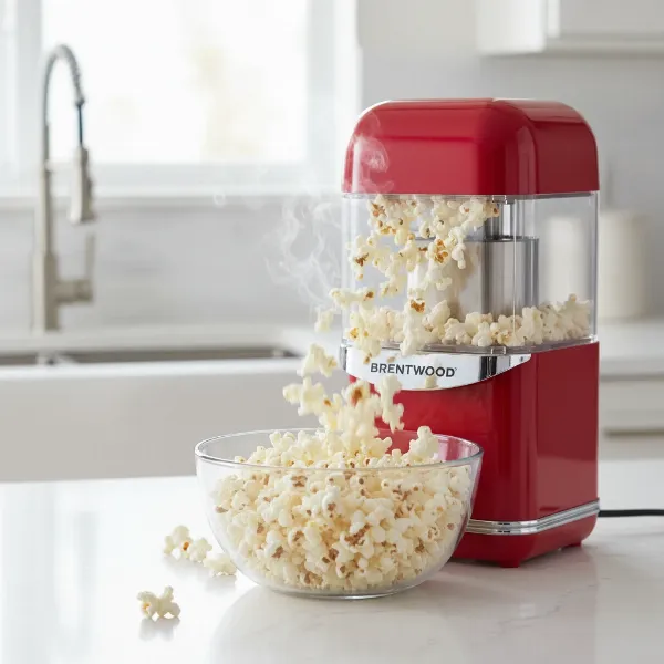 Brentwood Hot Air Popcorn Maker popping kernels into a large bowl