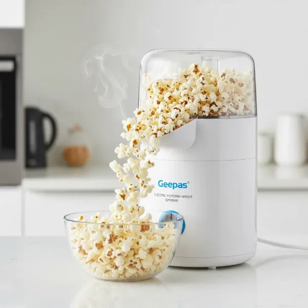 Geepas electric hot air popcorn maker producing healthy, oil-free popcorn in a modern kitchen.
