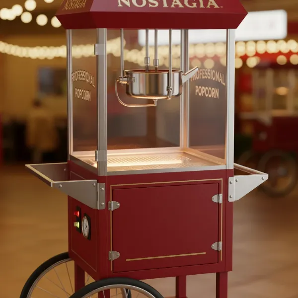 Close-up of Nostalgia Vintage Professional Popcorn Cart showing key features, kettle, glass, warming deck.